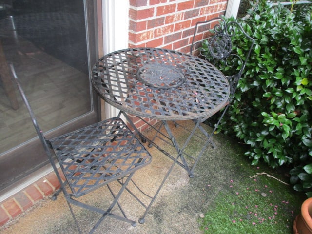 Black Metal Bistro Set with Palm Tree Design: Table 27"dia x 30"h, (2)15"w Chairs, all fold, some weathering, Local Pickup Only