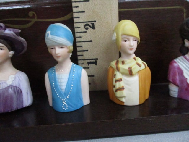8 Vintage Avon Lady Thimbles on Wooden Shelf - 8