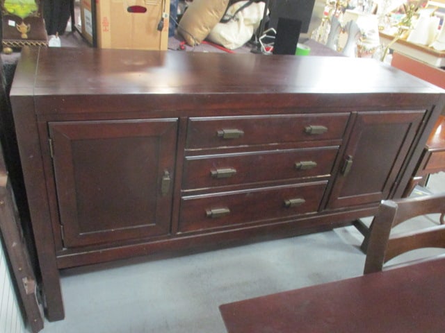 Berlin Woodworking American Hardwood Buffet Server: 68" x 20" x 39 1/2", three dovetail drawers, top drawer lined with dividers, ends have door storage with adjustable shelf, some scuffs, finish chips on corners, Local Pickup Only