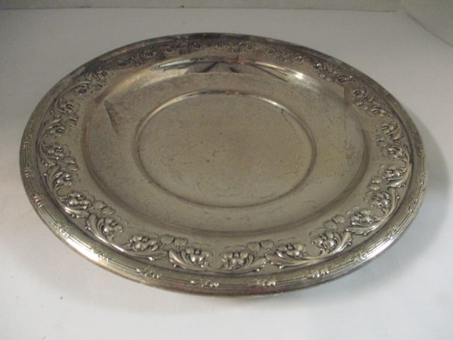 Vintage Floral Relief Design Sterling Silver Dish: 5.81 troy ounces, 9"dia, bottom marked with Lion with foot on "E" in shield 456-9 on bottom