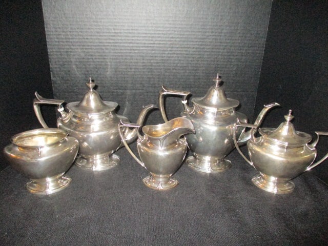 Vintage Durgin "Chatham" Sterling Silver Hollowware Coffee Pot, Teapot, Creamer,: Sugar with Lid and Waste Bowl. 69.00 Troy ounces total, all monogramed with "M", Coffee pot 20.58 troy ounces 8 3/4"h, Teapot 20.69 troy ounces 8 1/4"h, Creamer 8.10 troy ounces 5 3/4"h, Sugar bowl 11