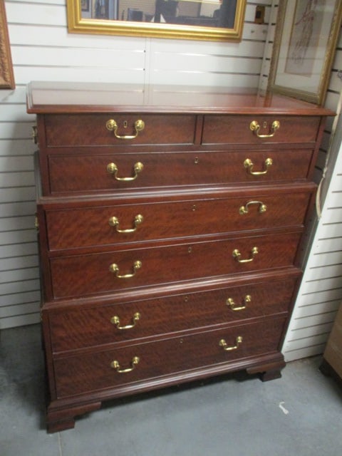 Baker Furniture Historic Charleston Reproductions Flame Mahogany Chest on Chest: 46 1/4" x 24" x 53 1/4", seven dovetail drawers with brass swan neck bail handles, drawers have locks but do not have keys, brass swan neck bail handles on sides, three(3) piece chest on chest, few