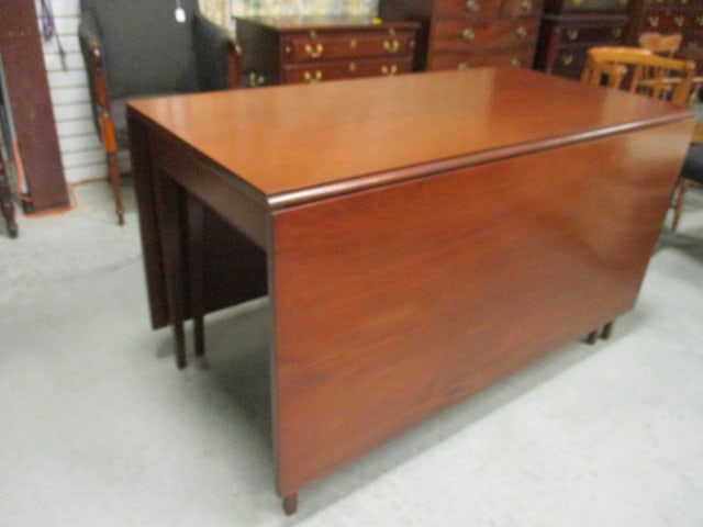 Vintage Mahogany Gateleg Table: Square tapered legs, Table sides down 27" x 51 1/2" x 30", Table sides up 74 1/2" x 51 1/2" x 30", some scuffs and color covered scratches, Local Pickup Only