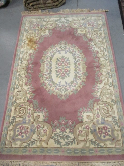 Genuine Chindia All Pure Wool Pile Hand Woven Pink/Ivory Border Rose Medallion Area Rug: 3'-11" x 6'-6", No. 1-1962 Color Rose Design 9670, pile has some surface stains, Local Pickup Only