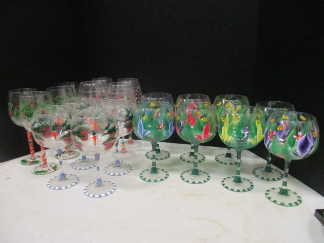 Large Collection of Whimsical Handpainted Stemware: (4)8 1/2" holly design, (4)9" confetti design, (4)7 3/4" rabbit topiary design, (8)7 3/4" honey bee and flower design, Local Pickup