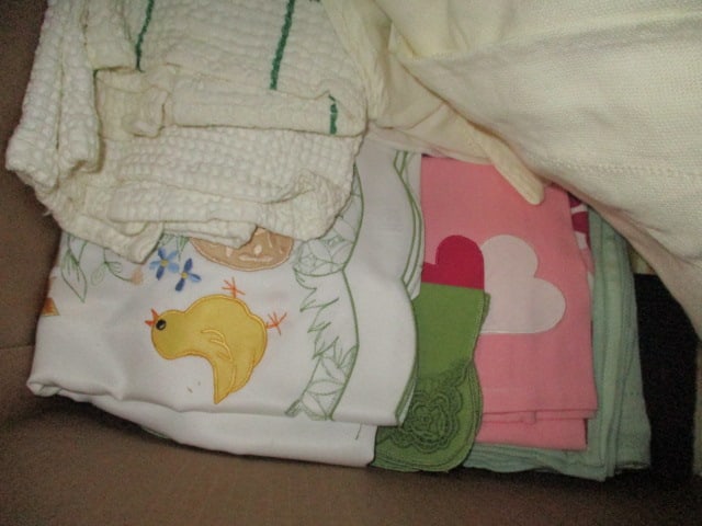 Grouping of Table Cloths, Placemats, Woven Chargers, Fabric Bread Basket, etc. - 3
