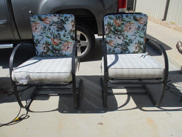 Pair of Black Metal Canilever Bouncy Chairs: 23 1/4"w, cushions weathered with some tears, Local Pickup Only