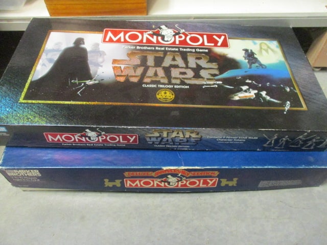 Parker Brothers (Lot of 2) Monopoly Sets: Star Wars Classic Trilogy Edition & Deluxe Anniversary Edition