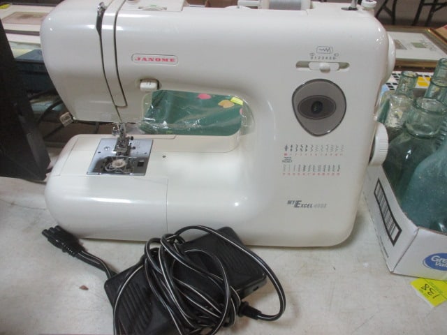 Janome MyExcel 4023 Portable Sewing Machine in Case: Needle moves freely manually but could not get needle to go up & down from pedal)