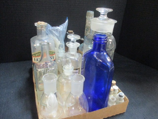 Clear Glass Apothecary Bottles & 1 Cobalt Blue Bottle: some have labels