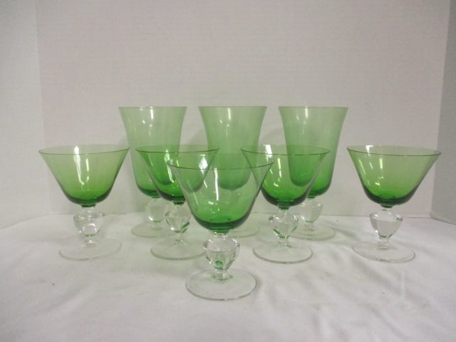 Hand Blown Green Crystal Goblets and Champagnes with Clear Stems: (3)7"h goblets, (5)5"h champagnes