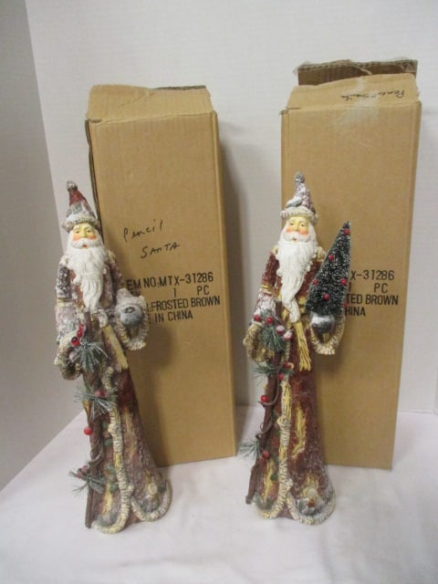 Pair of Sculpted Composite Old World Pencil Santas with Original Boxes: 17 1/2"h, one missing tree in left hand