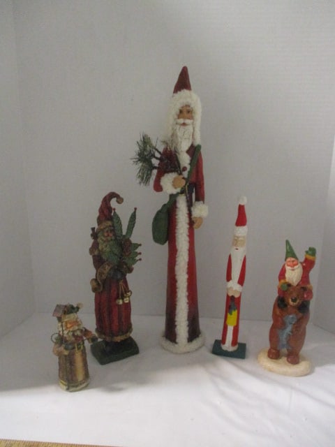 Five Sculpted Composite Santa Figures: .