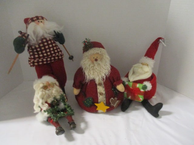 Four Fabric Santa Figures: .