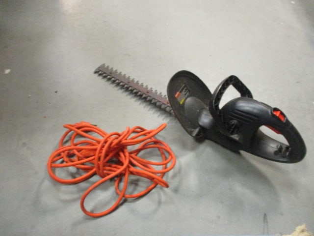 Black & Decker 17" Electric Hedge Trimmer: Model TR1700, includes heavy duty extension cord, powers on, Local Pickup Only