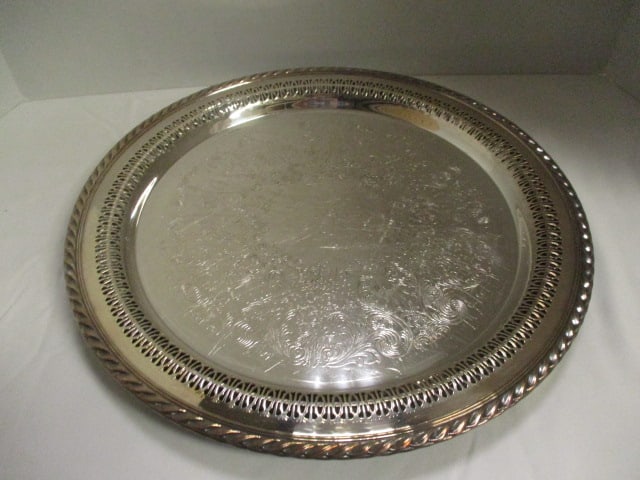 Five Round Silverplated Serving Trays - 5