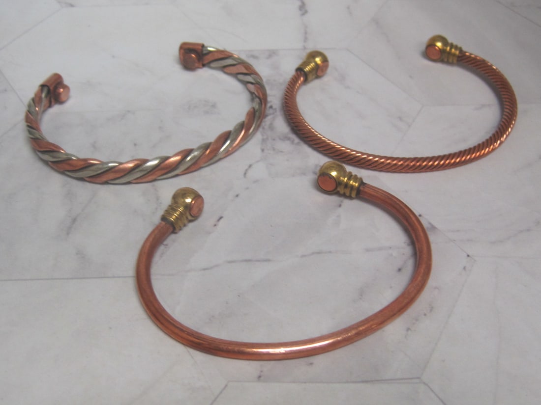 Lot of 3 Copper Cuff Bracelets: .