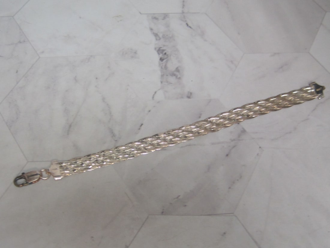 7" Sterling Silver Braided Bracelet: Weighs 8.4 grams