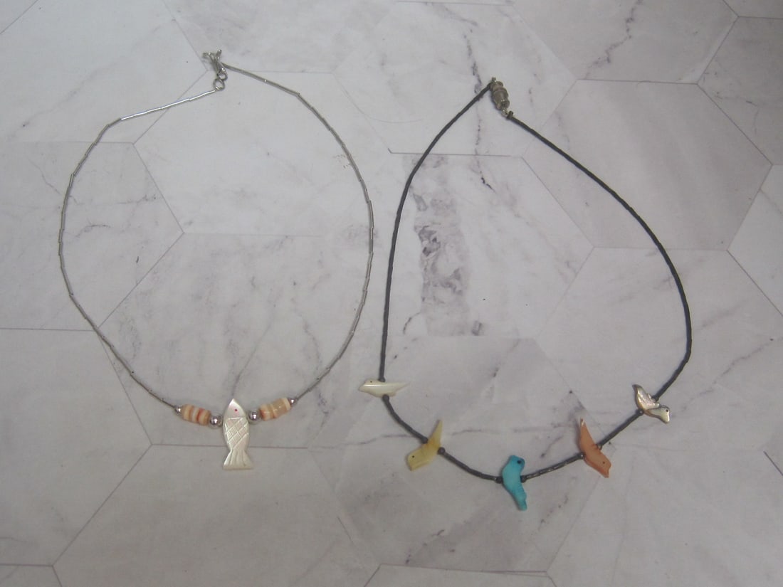 Lot of 2 Liquid Silver Necklaces with Pendant: .
