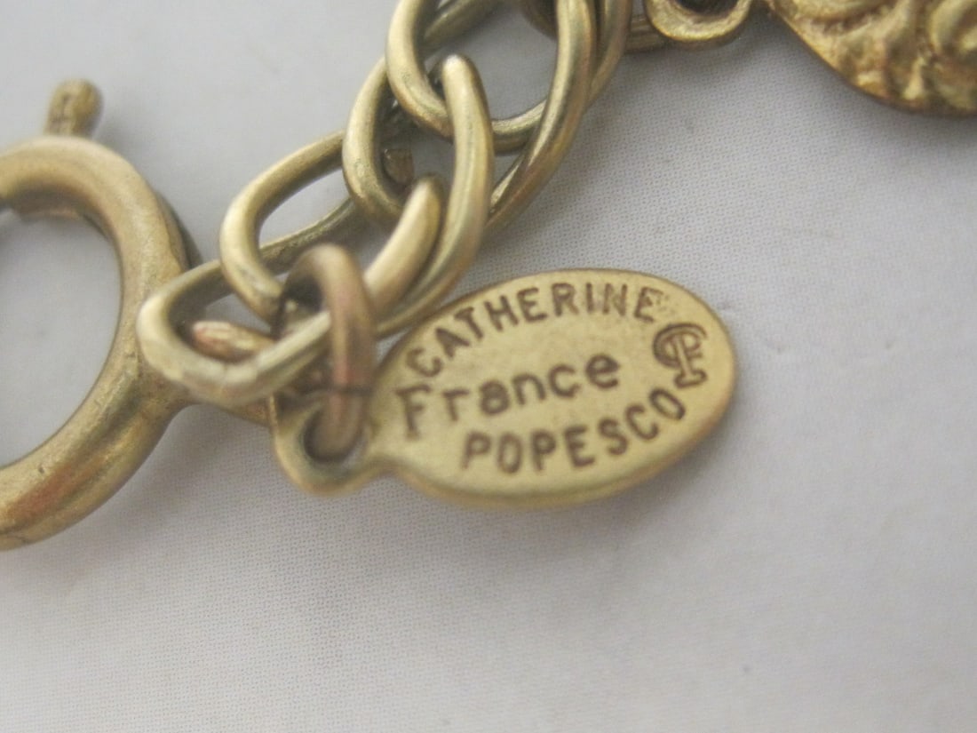 7 1/2" Catherine Popesco France Goldtone Charm Bracelet - 6