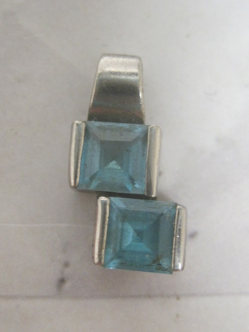 Sterling Silver Blue Topaz Pendant: Weighs 3.2 grams
