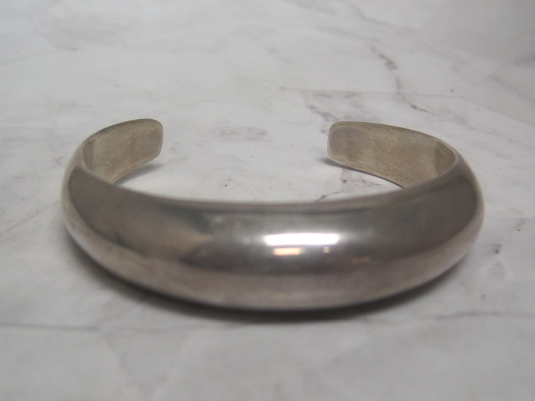 Sterling Silver Cuff Bracelet: Weighs 27.3 grams