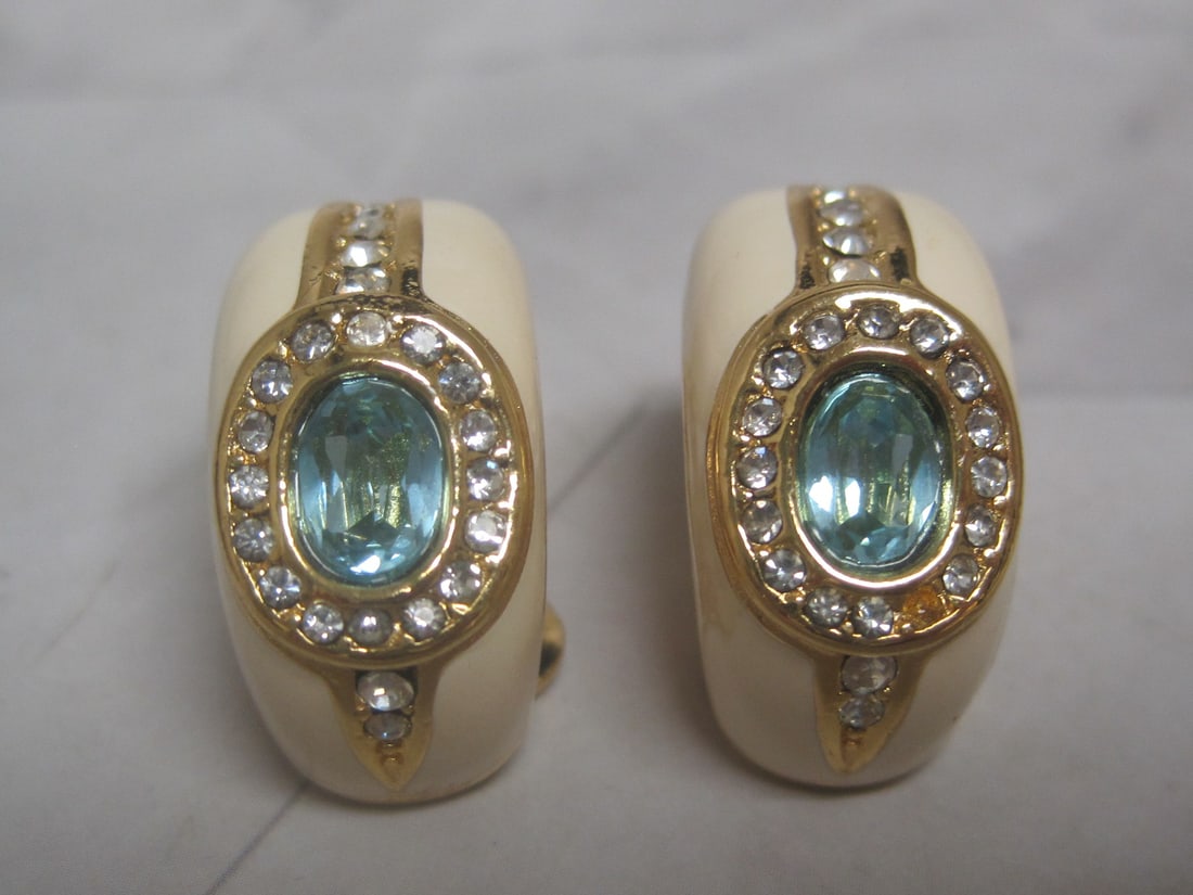 Christian Dior Goldtone Clip Earrings: Cream enamel with blue & clear rhinestones