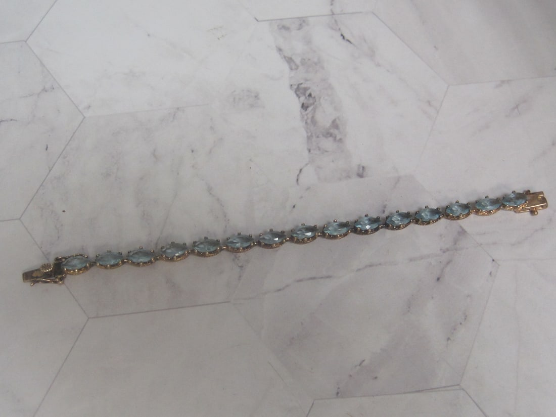 6 1/2" Sterling Silver Vermeil Blue Topaz Bracelet: Weighs 12.4 grams