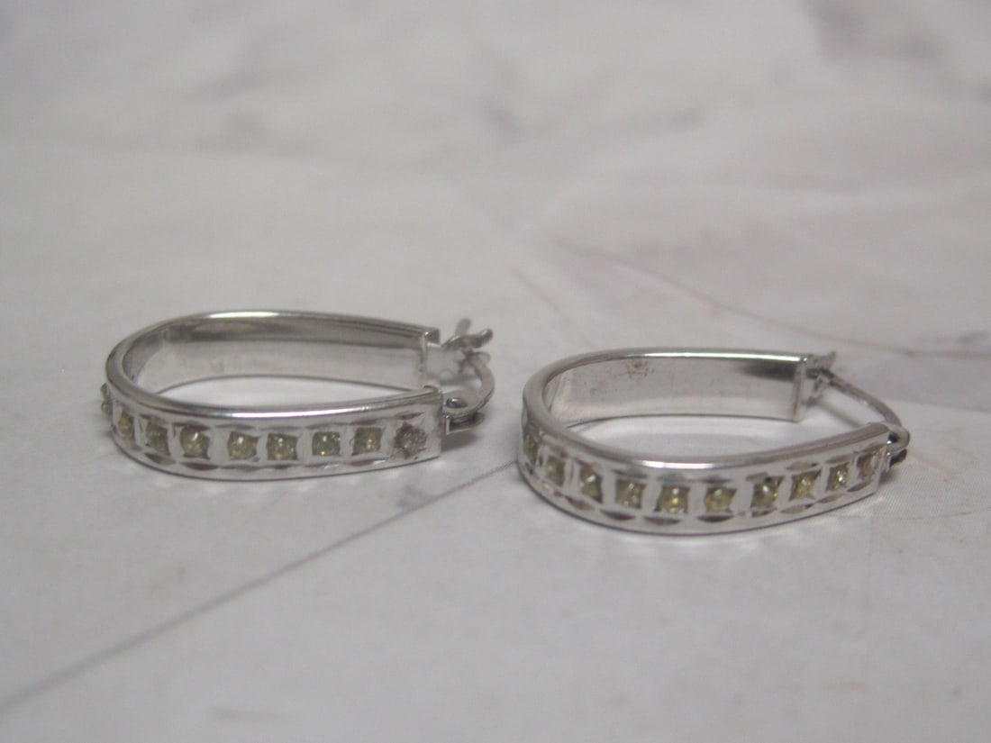 Sterling Silver Oval Hoop Earrings with CZ Stones: Weighs 1 gram