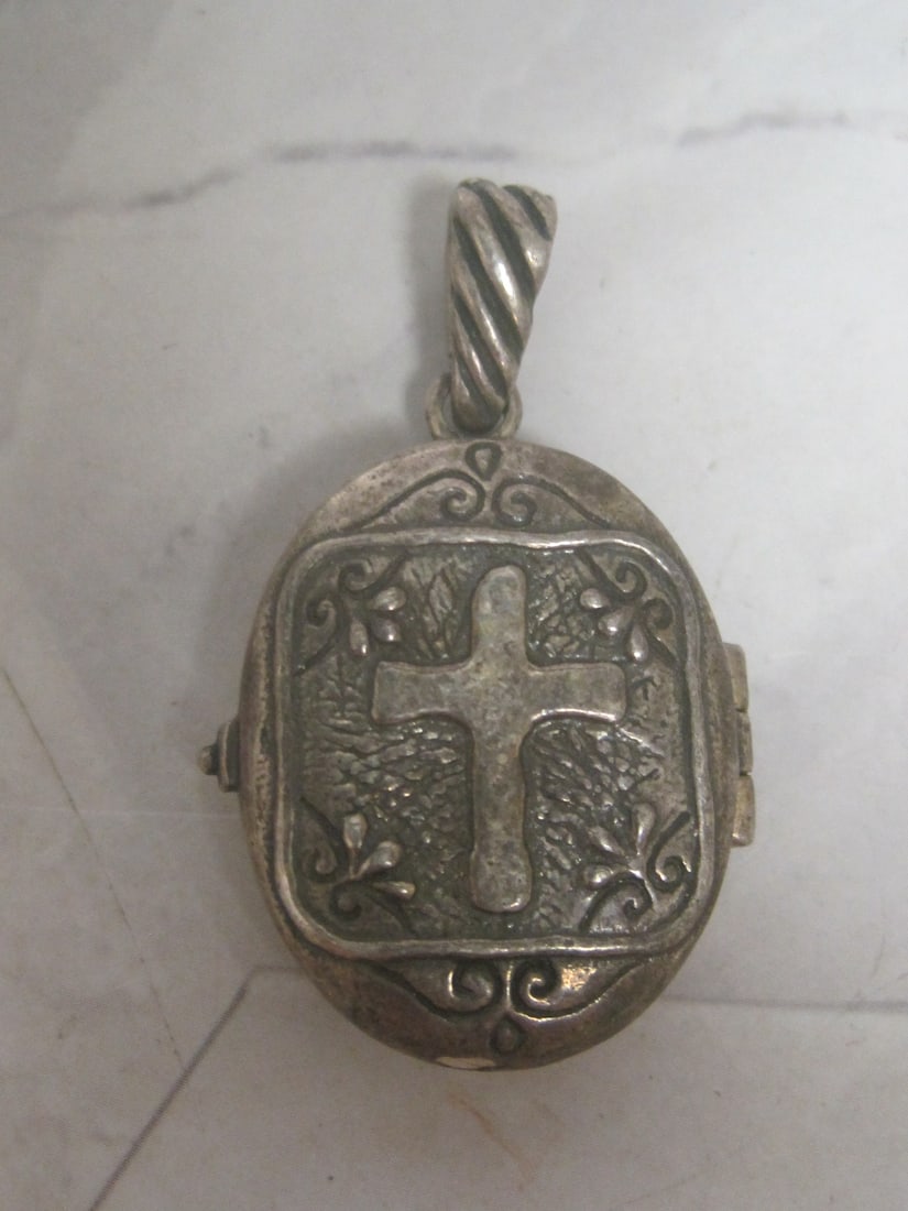 Israel Sterling Silver Cross Locket with The World's Smallest Bible inside: Weighs 10.6 grams, The world's smallest bible on the inside is printed on a 5mm x 5mm silicon chip
