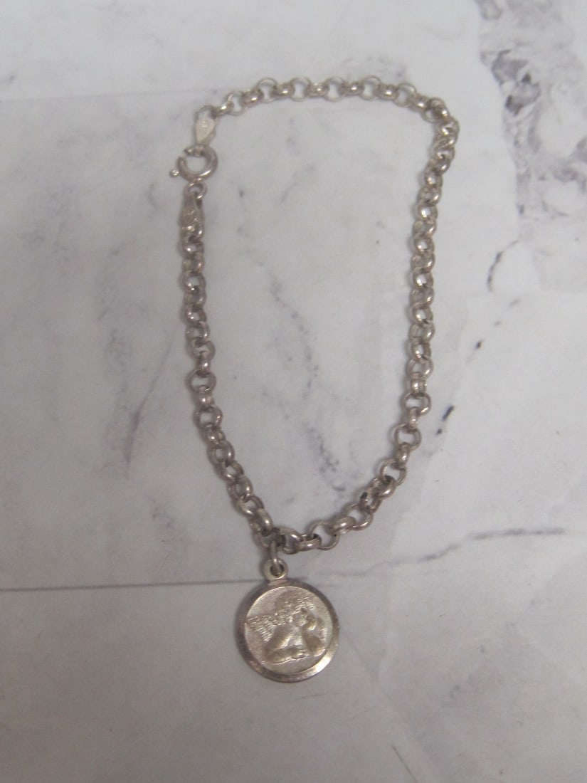 7" Sterling Silver Bracelet with Cherub Charm: Weighs 5 grams