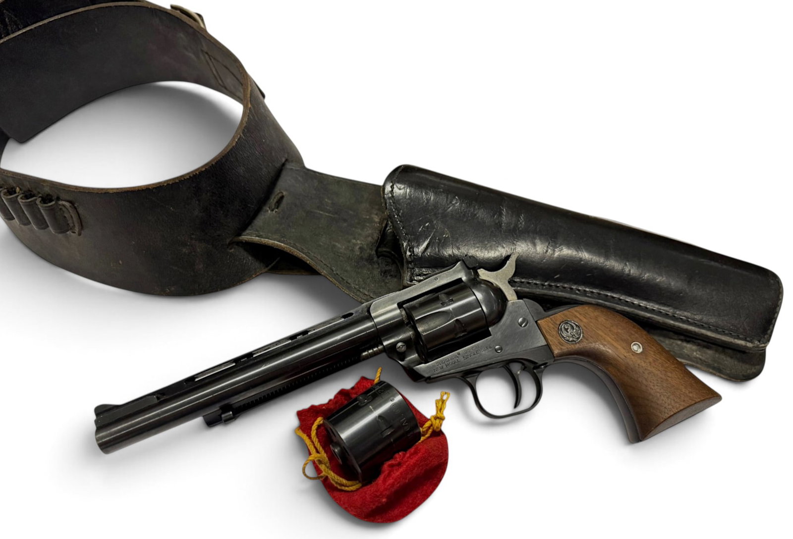 Excellent 1978 Ruger New Model Single-Six .22 LR Revolver with Holster and .22 WMR Cylinder: S#: 65-65013 | 6.5" Vent-Rib Barrel, and Target sights | Comes with Cowboy Styled Holster, Cartridge Belt and Factory Ruger .22 Win. Mag. Cylinder |||| CONDITION: Excellent. Retaining 98% Original Blu