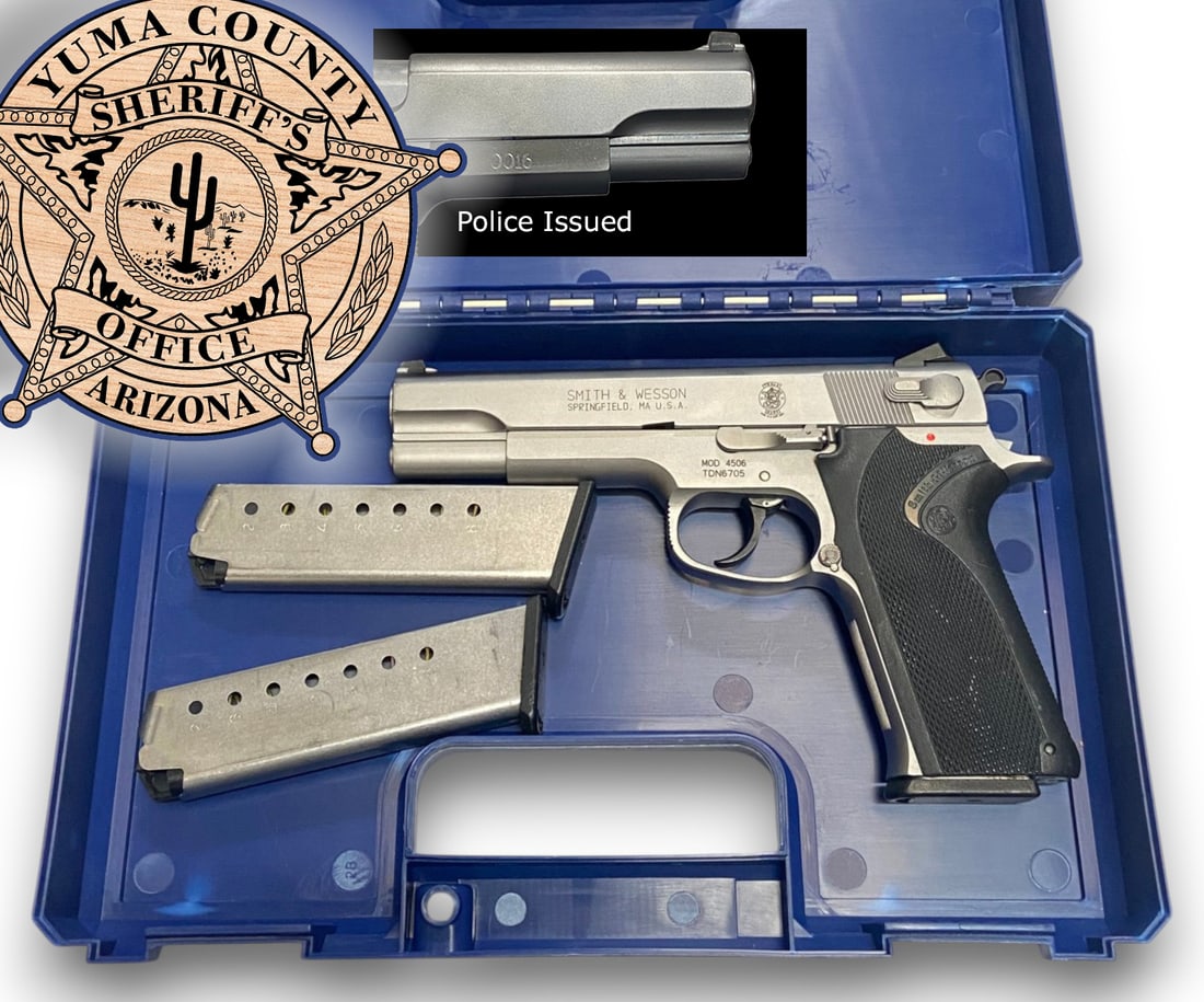Excellent 1989 Yuma County, AZ Police Smith & Wesson Model 4506 .45 ACP Semi-Automatic Pistol in ...: S#: TDN6705, mfg. 1989 | 5" Barrel | Comes with (3) 8rd magazines and Smith & Wesson hard case | Yuma County sheriff's office, Arizona. Marked with badge number 0016 engraved on the side |||| CONDITIO