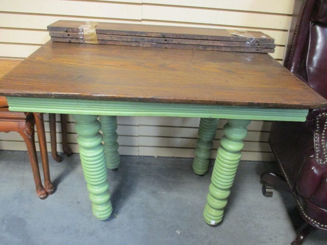 Antique Oak Farm Table with Painted Green Turned Spindle Legs: 40" x 27" x 30 1/2", (3)7" leaves, table top has been secured in place, leaves were saved but cannot be installed, Local Pickup Only