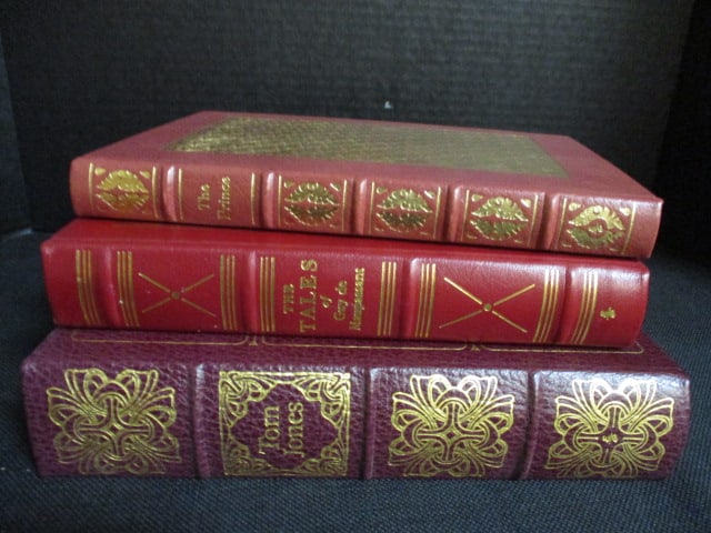 Three Eastman Press Leather Bound Classic Works of Literature: "The Tales of Guy De Maupassant", "The Prince" by Niccolo Machiavelli and "The History of Tom Jones a Founding" by Henry Fielding. Books copyrights range from 1960-80's