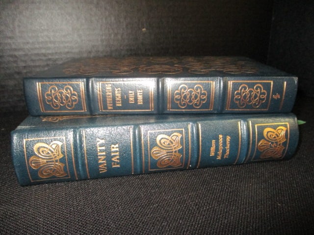 Two Eastman Press Leather Bound Classic Works of Literature: "Vanity Fair" by William Makepeace Thackeray and "Wuthering Heights" by Emily Bronte Books copyrights range from 1960-80's