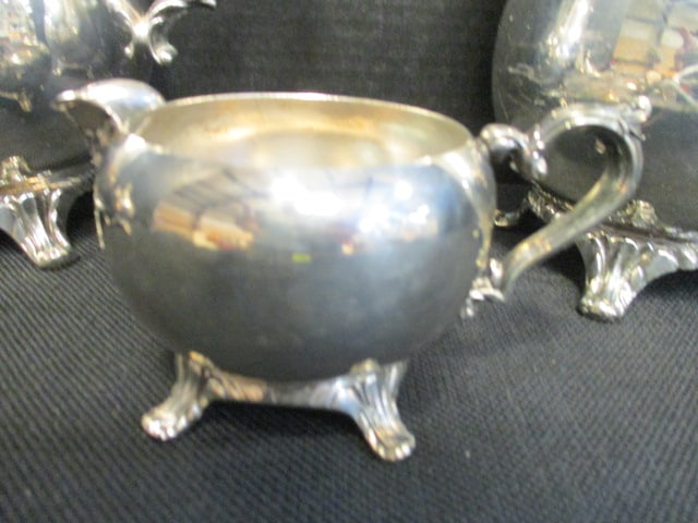 Matching Pattern Silverplated Creamer, Sugar Bowl and Two Footed Pitchers with Ice Lips - 7