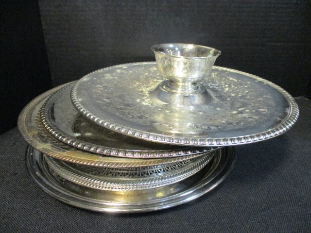 Grouping of Round Silverplated Serving Trays: .