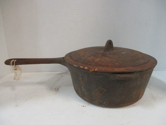 Cast Iron 3 Quart Covered Sauce Pan: 8 1/2"dia x 4 1/2"h, marked Made in USA 3 Quart on bottom and 3 on inside lid, rusted