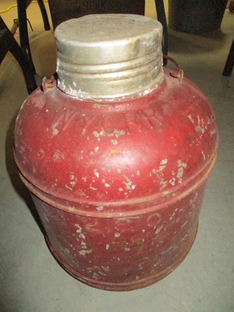 Vintage "New York Central Railroad" Insulated Water Jug/Cooler: 12 1/2"h, painted red, tin lid is stuck and split, bottom is rusted, marked in raised letters "NYCRR" on shoulder-see pictures and preview for condition