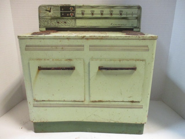 Vintage "Kenmore" Toy Lithograph Tin Stove: 14" x 7 1/4" x 15 1/4", well used condition, rust spots and dings-see pictures and preview for condition