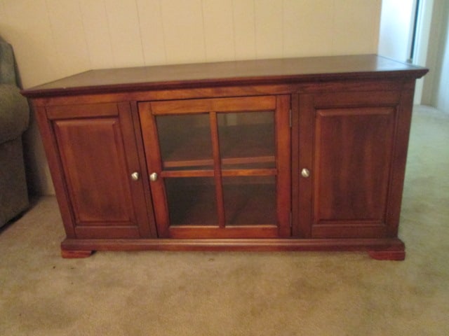 Royola Pacific Ltd. Console Cabinet with Glass Front and Bookcase Sides: 48" x 20" x 25", 4 panel glass door with adjustable shelf, both ends have one adjustable shelf, back panel has electronic cable grommet, few scuffs on corners, Local Pickup Only