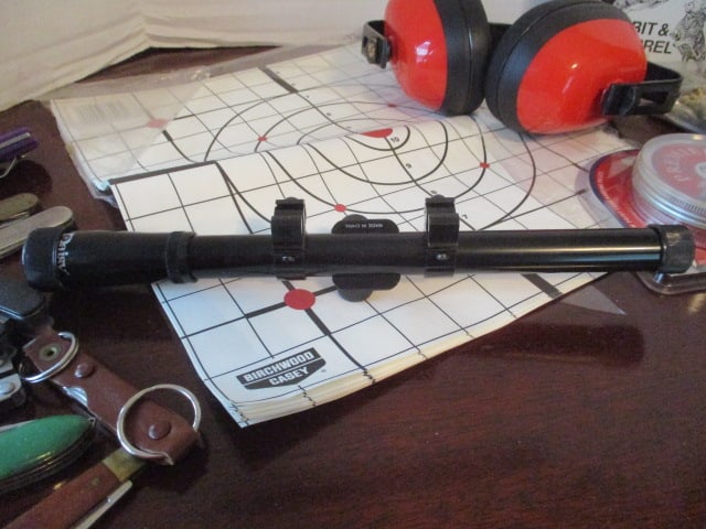 Grouping of Various Brand BBs, 22 Caliber Shells, Ear Protection, Scope, Targets, etc. - 5