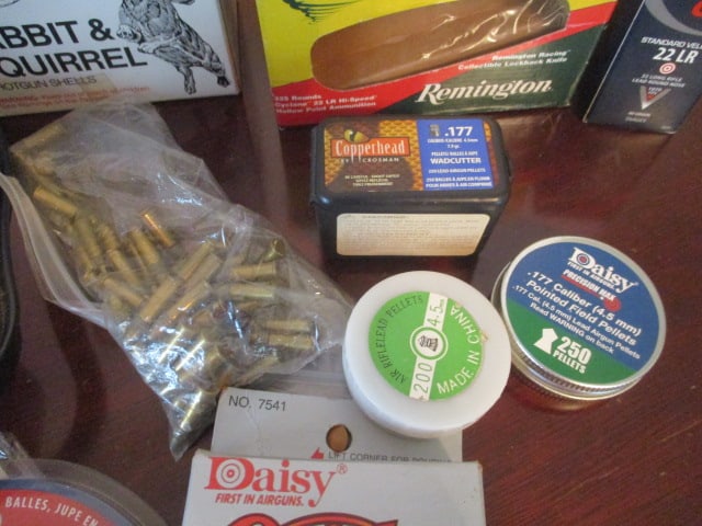 Grouping of Various Brand BBs, 22 Caliber Shells, Ear Protection, Scope, Targets, etc. - 8