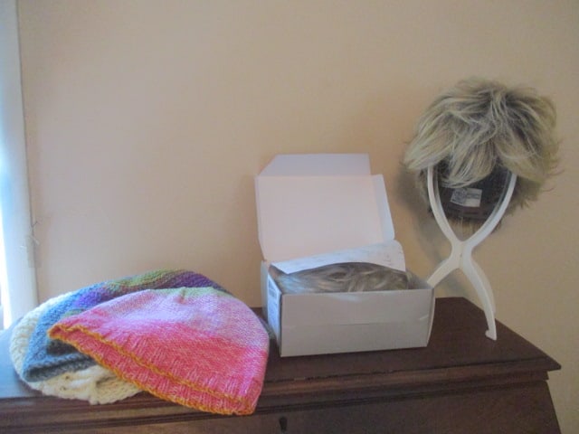 Two Ladies Synthetic Hair Layered Shag Cut Wigs and Handmade Chemo Caps: Wigs "TLC" in original box, Toni Brattin with stand