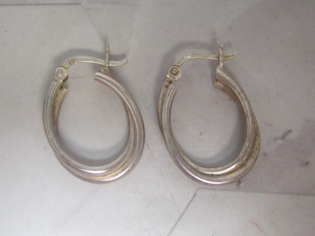 Sterling Silver Oval Hoop Earrings: Weighs 3.4 grams