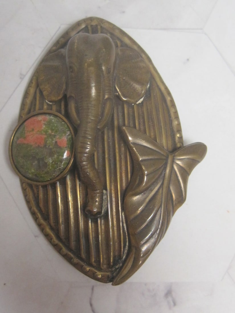 Marjorie Baer Brooch: Featuring a hammered brass elephant & leaf design accented by a unakite stone