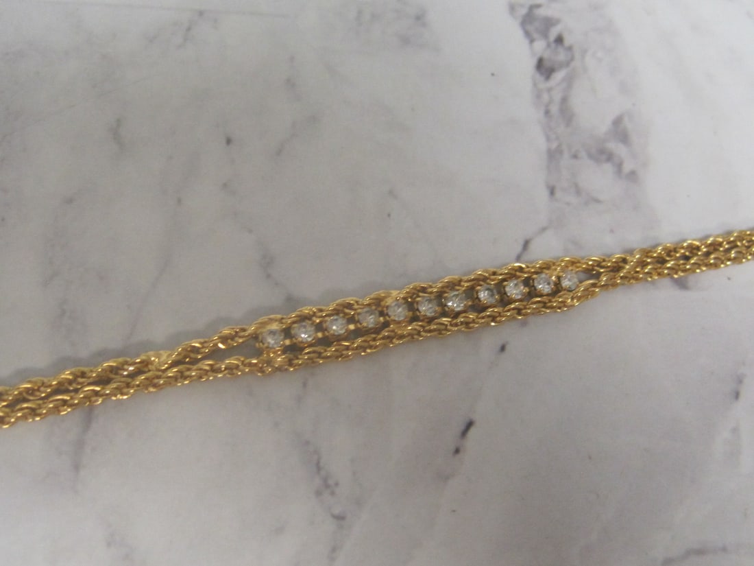 7" 14k Gold Shell Bracelet with CZ Stones: Marked 14KGS