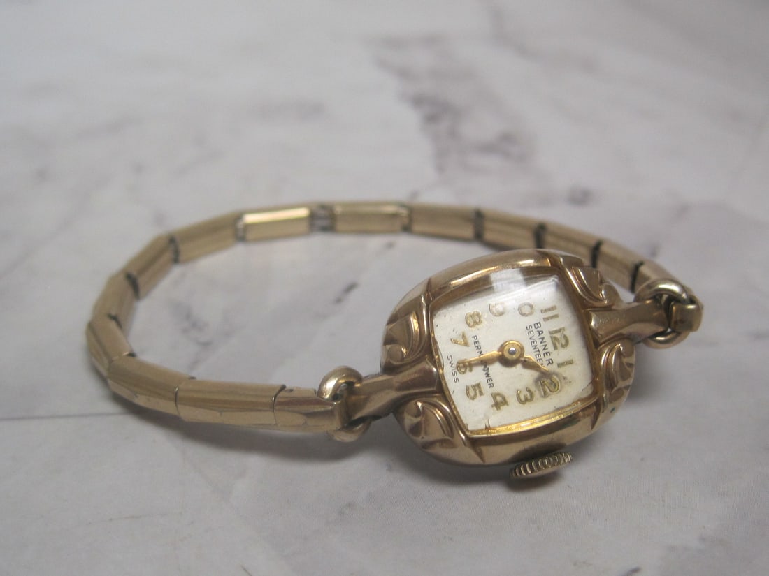 Circa 1940's-1950's Banner Seventeen Permapower Ladies Watch: 10k Rolled Gold Plated Bezel, Band has 10k Gold-filled Top caps, Runs