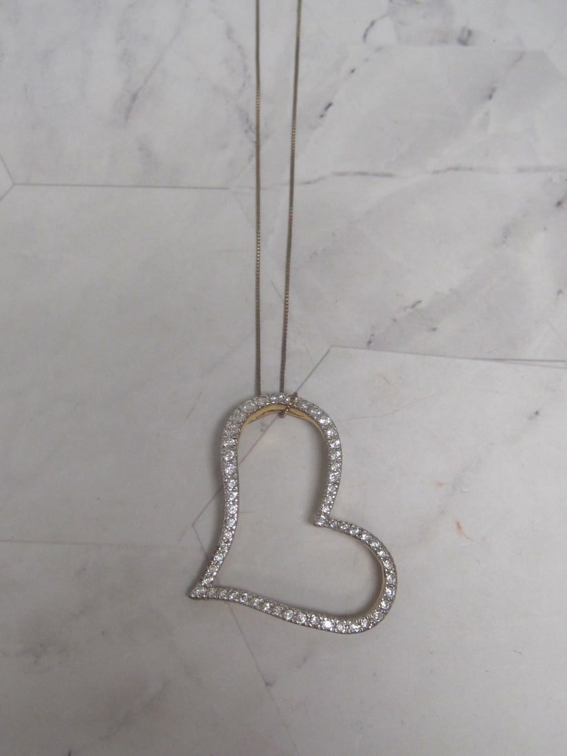 Sterling Silver Floating Heart with CZ Stones Pendant on 18" Sterling Silver Vermeil Chain: Weighs 8 grams